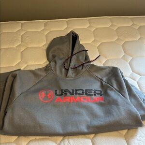 Under Armour Charcoal Hoodie with Vibrant Red Accents